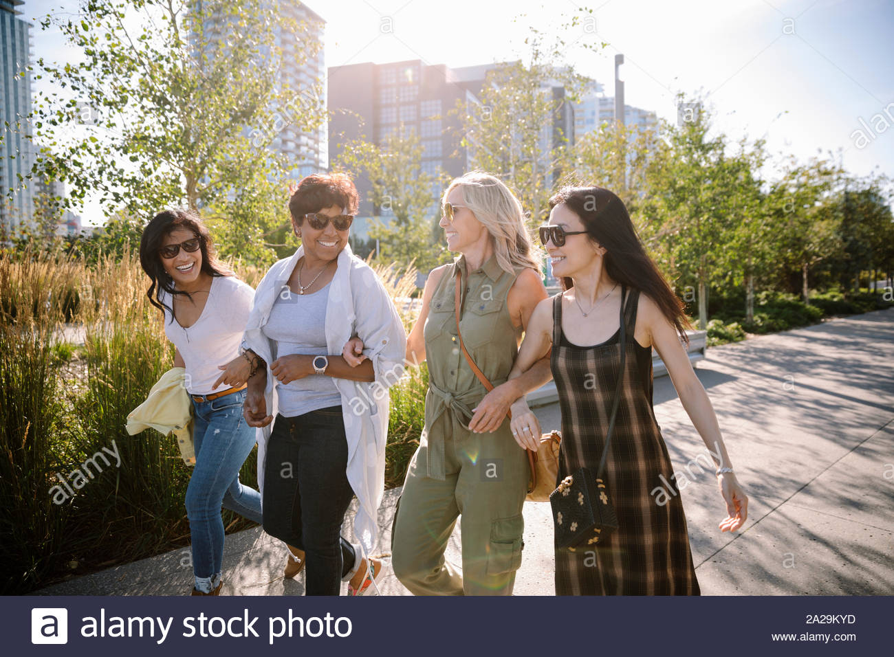 Happy smiling mature woman walking hi-res stock photography and images ...