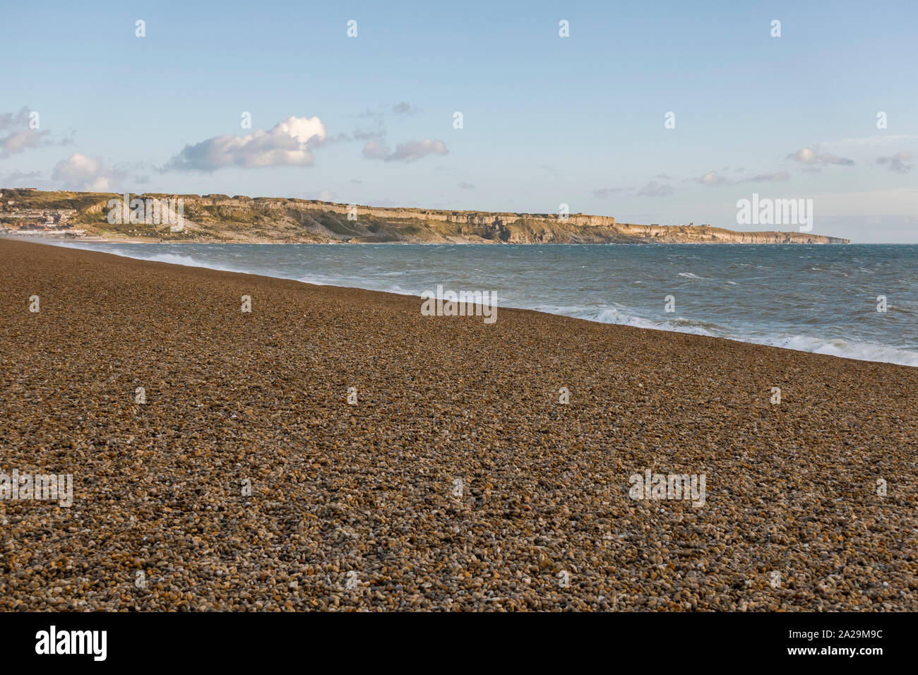 Chesil Beach, covered with Shingle, the isle of Portland in the