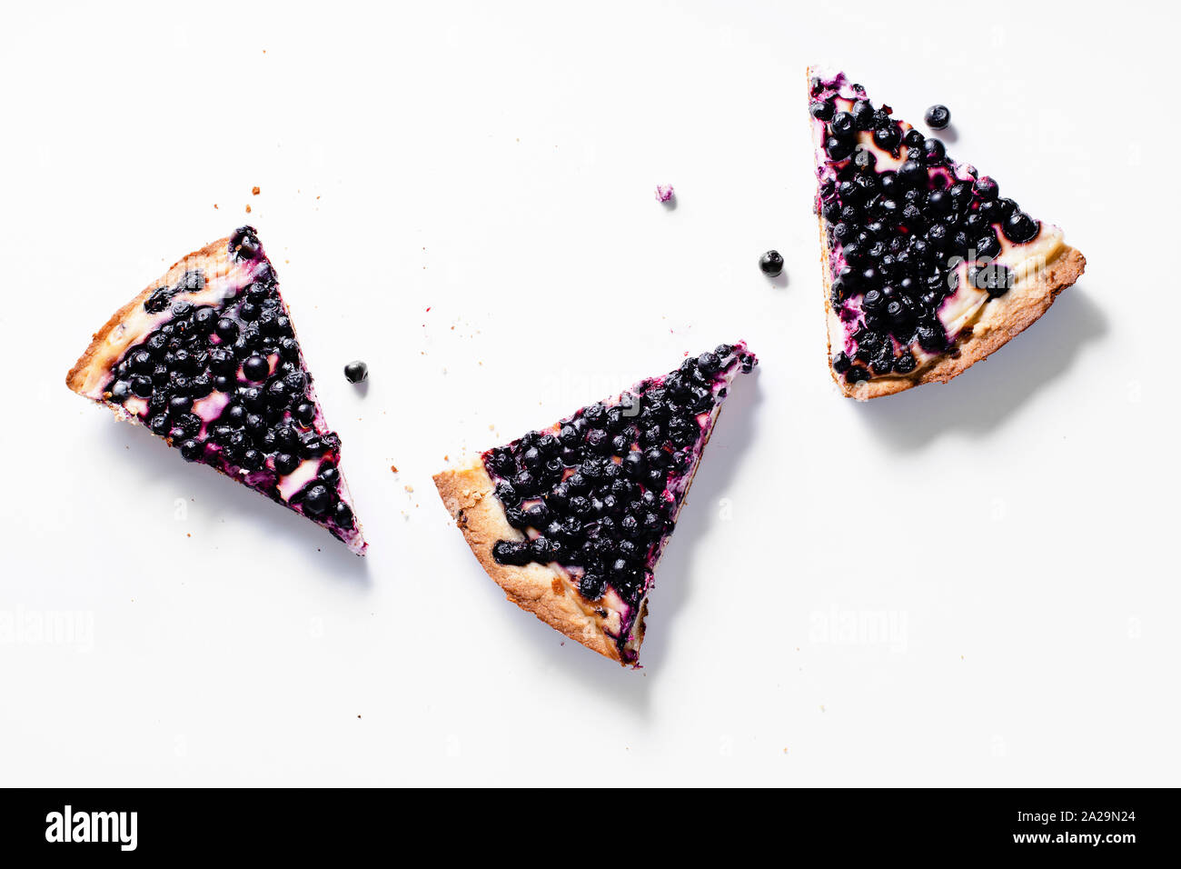 Pieces of summer tart with fresh blueberries Stock Photo