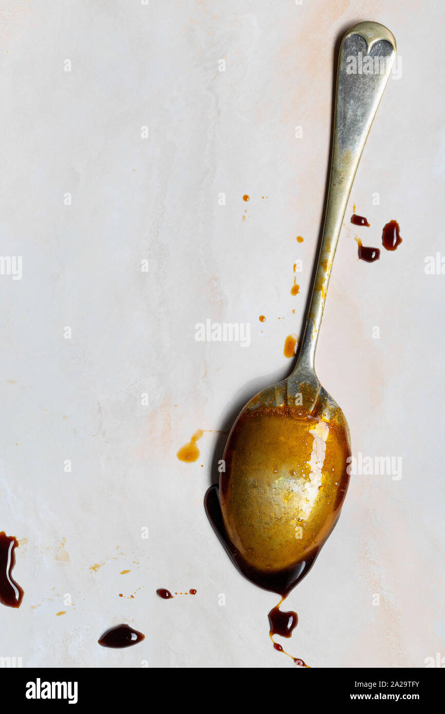 Dripping syrup spoon hi-res stock photography and images - Alamy