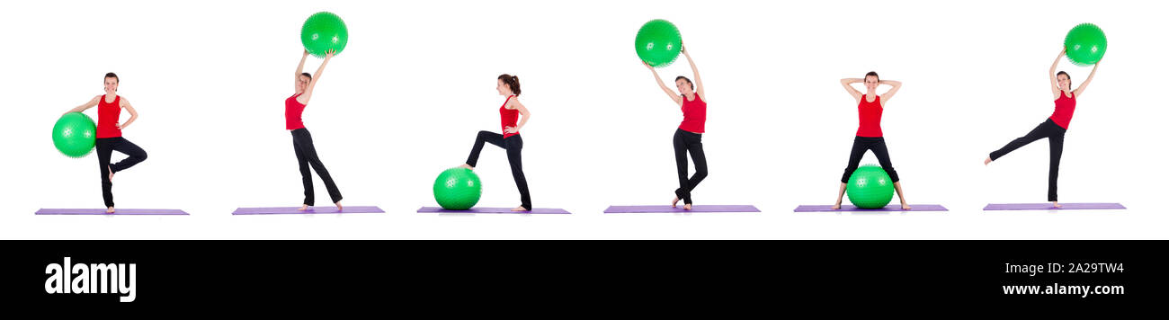 The young woman exercising with swiss ball Stock Photo - Alamy
