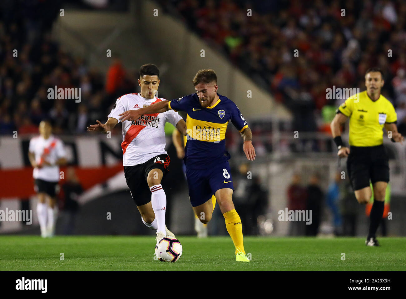 Buenos Aires, Argentina - Octobet 01, 2019: Alexis Macallister (Boca) trying to outrun then River Plate defense in Buenos Aires, Argentina Stock Photo