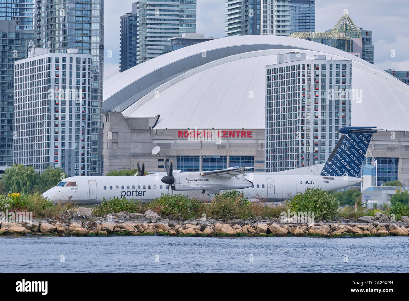 Porter Dash 8 commuter plane ready for takeoff from Billy Bishop Airport in Downtown Toronto. Stock Photo