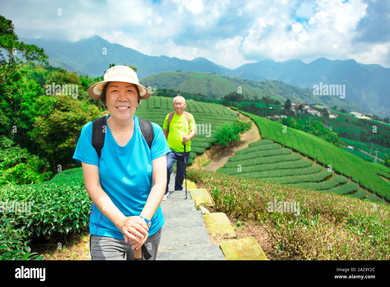 Asian woman hiking in field hi-res stock photography and images - Alamy