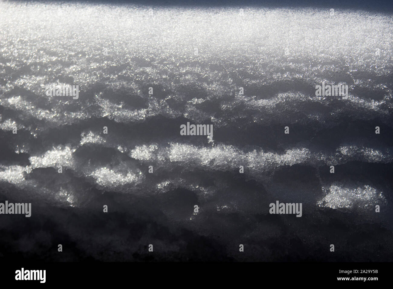 Snow texture with a hard light Stock Photo