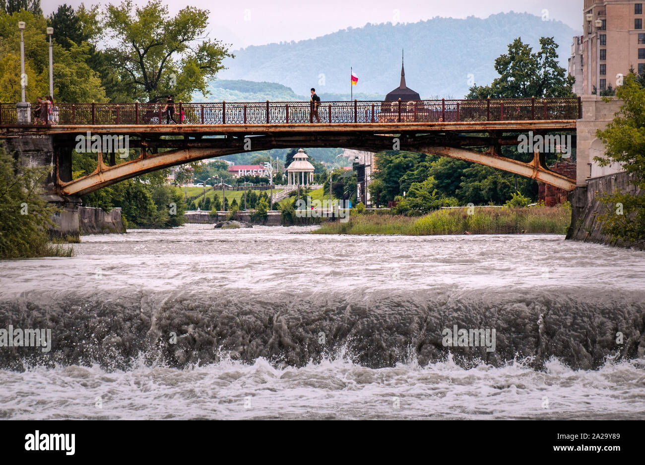 Summer view along the river Terek in downtown Vladikavkaz city. Russia, Ossetia, Vladikavkaz. Summer, spring Stock Photo