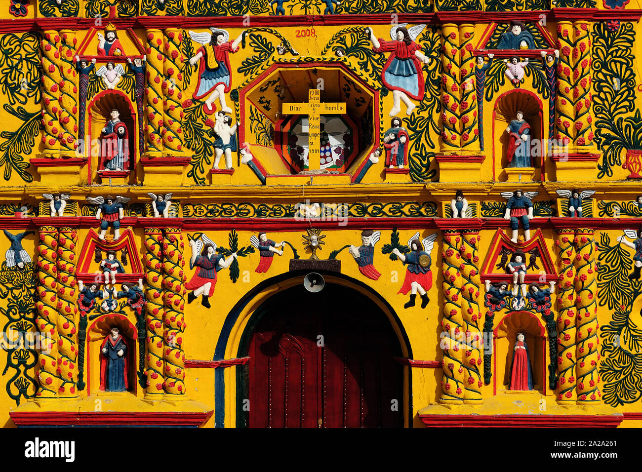 The most colour facade of the church in the San Andrés Xecul village in Guatemala, Central America Stock Photo