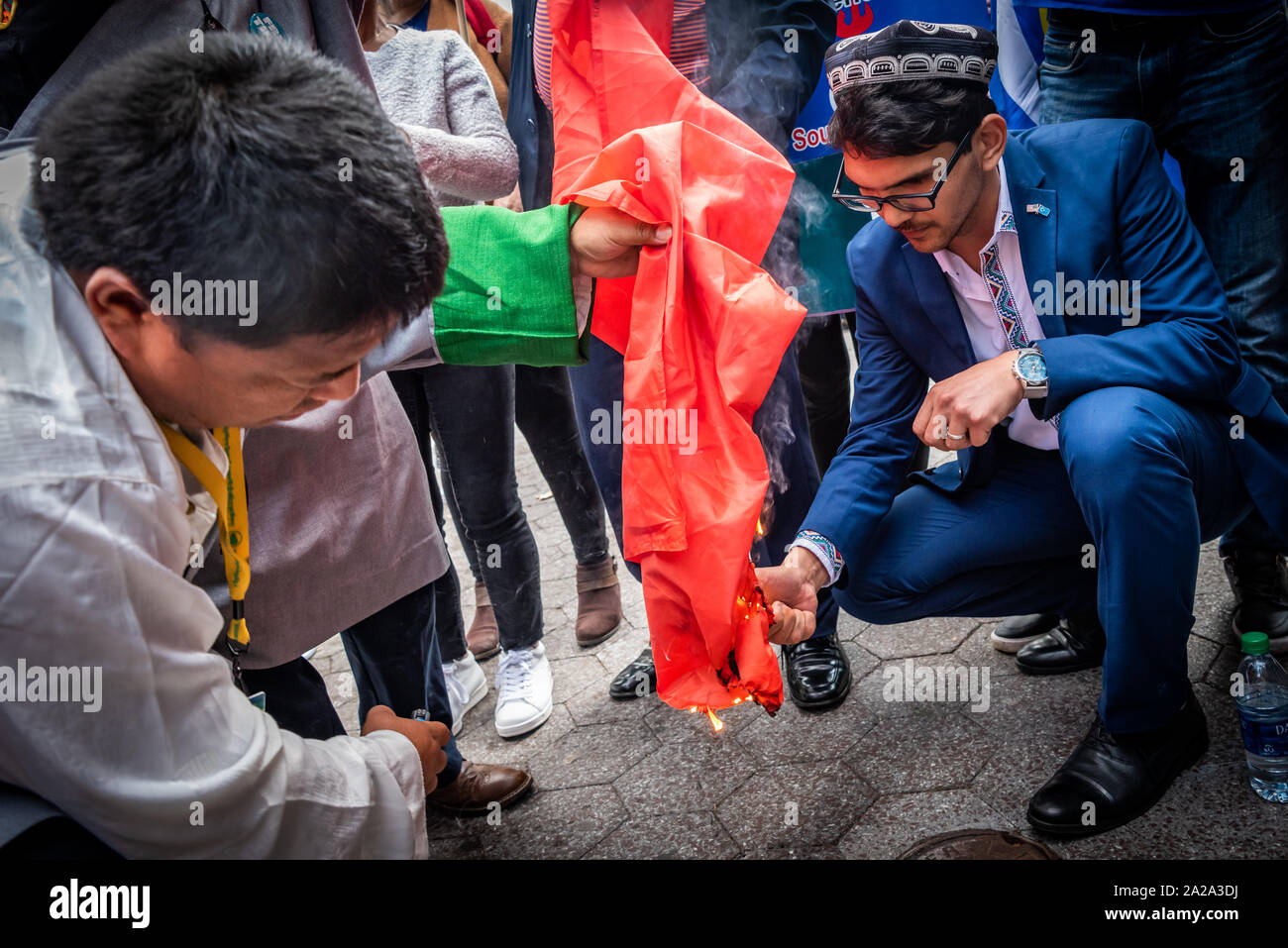 Chinese flag burning hi-res stock photography and images - Alamy