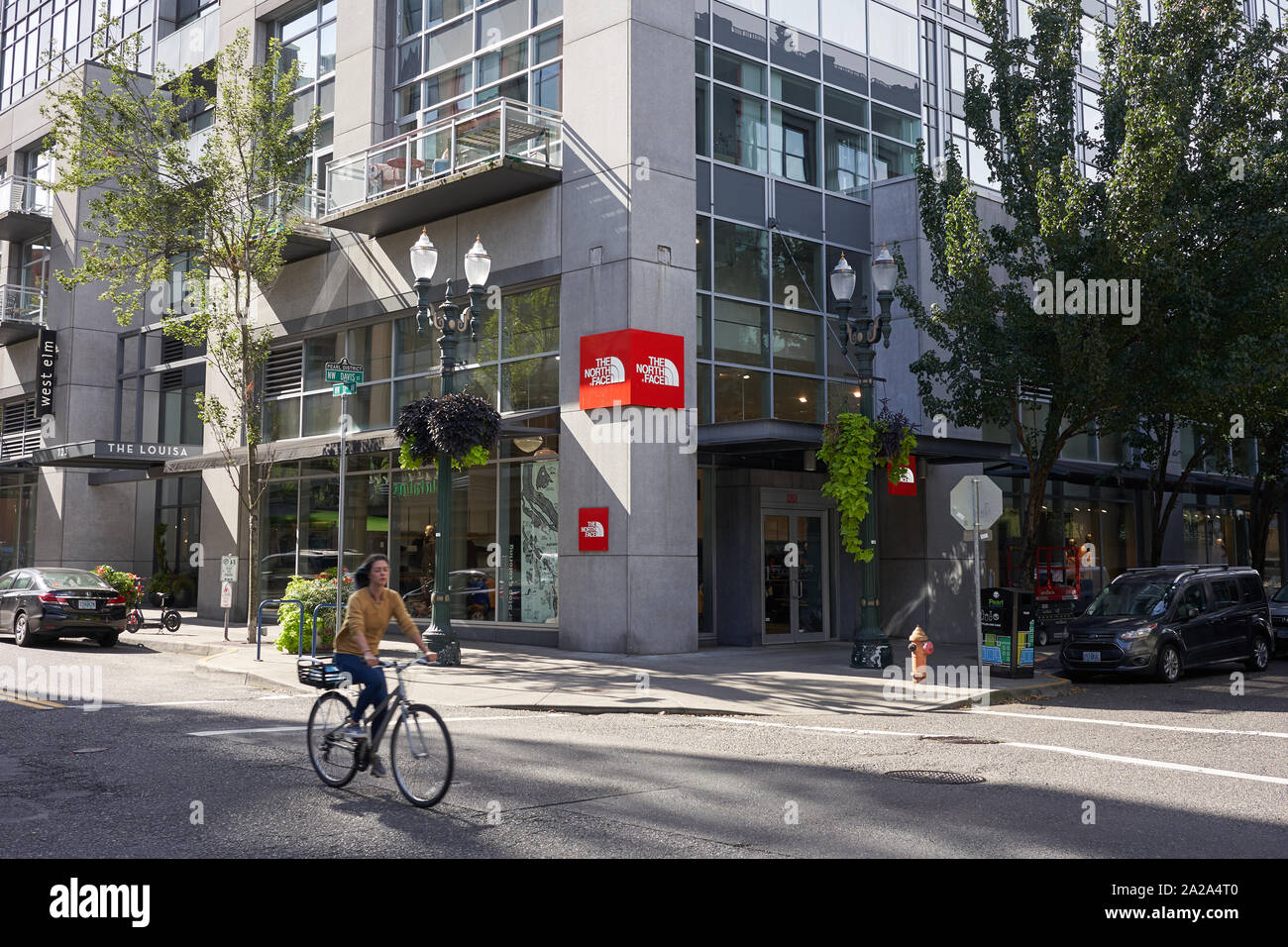 A cyclist passes the North Face Store in downtown Portland, Oregon, on  Friday, Sep 27, 2019 Stock Photo - Alamy