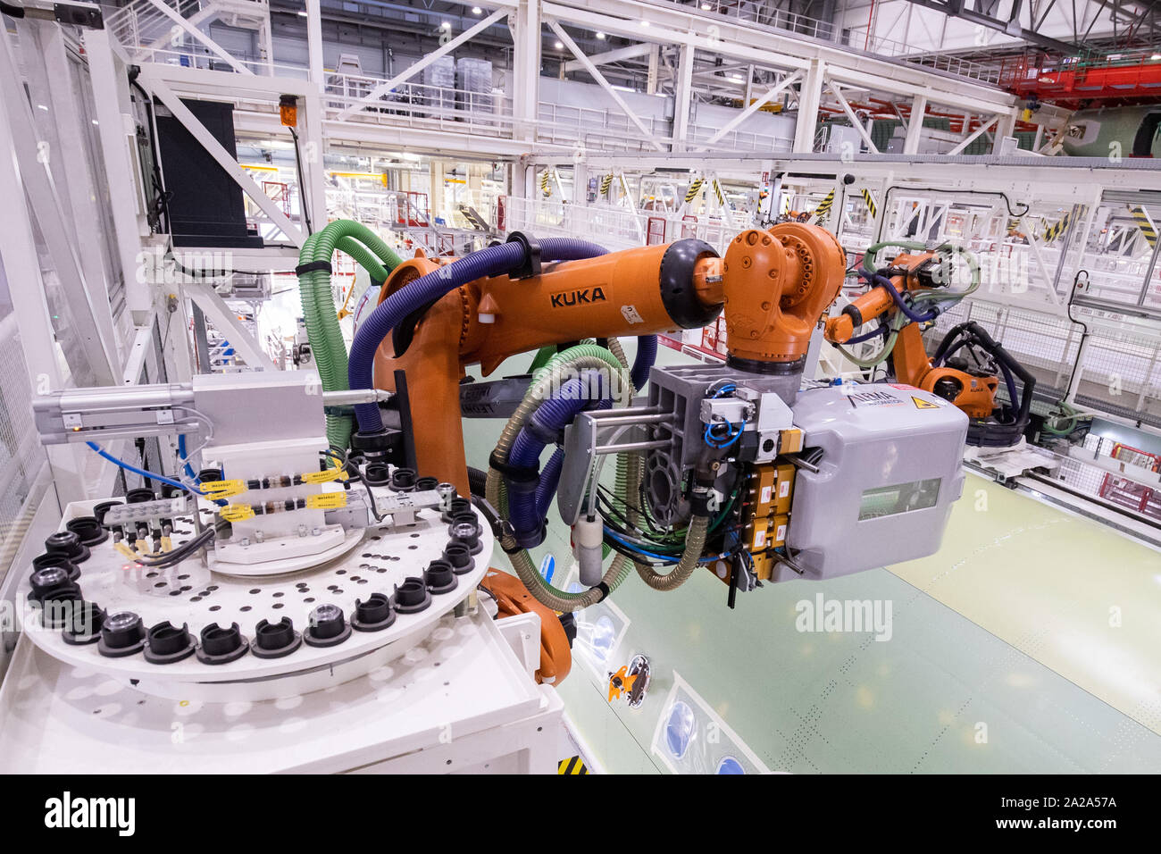 Hamburg, Germany. 01st Oct, 2019. Two robots drilling and setting ...