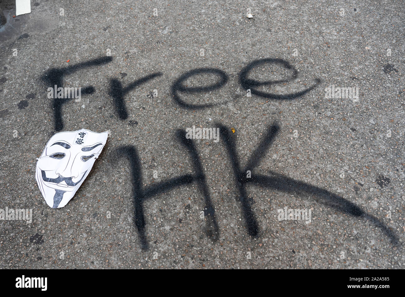 Hong Kong. 2 October 2019.  Many buildings and walls were vandalised and daubed with political slogans and anti-Chinese government and anti-police graffiti in Central and Wanchai districts by pro-democracy supporters on China's National Day on 1 October. Widespread clean-up operation is now underway. Iain Masterton/Alamy Live News. Stock Photo