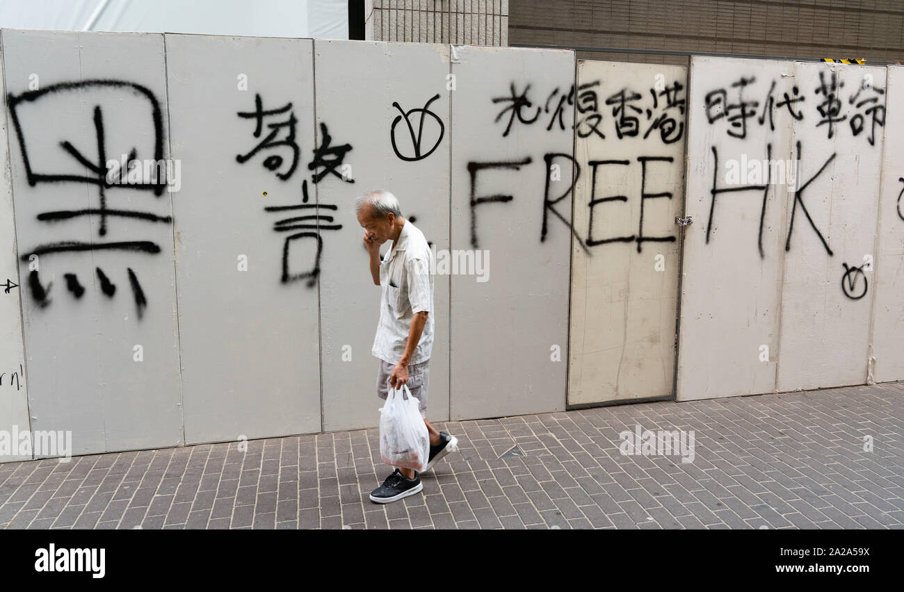Hong Kong. 2 October 2019.  Many buildings and walls were vandalised and daubed with political slogans and anti-Chinese government and anti-police graffiti in Central and Wanchai districts by pro-democracy supporters on China's National Day on 1 October. Widespread clean-up operation is now underway. Iain Masterton/Alamy Live News. Stock Photo