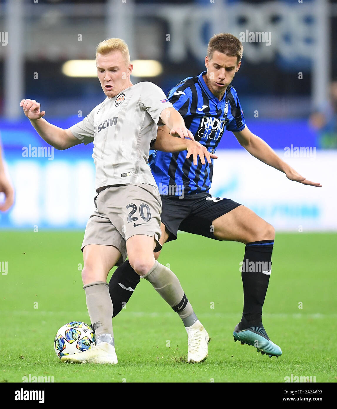 Milan, Italy. 1st Oct, 2019. Atalanta's Mario Pasalic (R) vies with FC Shakhtar Donetsk's Viktor Kovalenko during the UEFA Champions League Group C match between Atalanta and Shakhtar Donetsk in Milan, Italy, Oct. 1, 2019. Atalanta lost 1-2. Credit: Augusto Casasoli/Xinhua/Alamy Live News Stock Photo