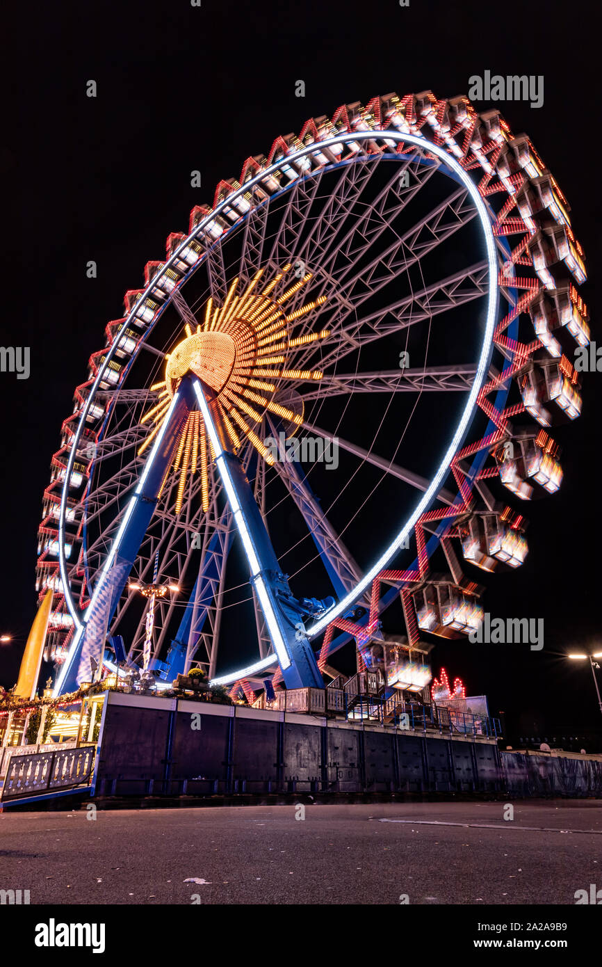 Munich, Germany - 2019, September 19: biggest ferris wheel at the Oktoberfest in Munich at night Stock Photo