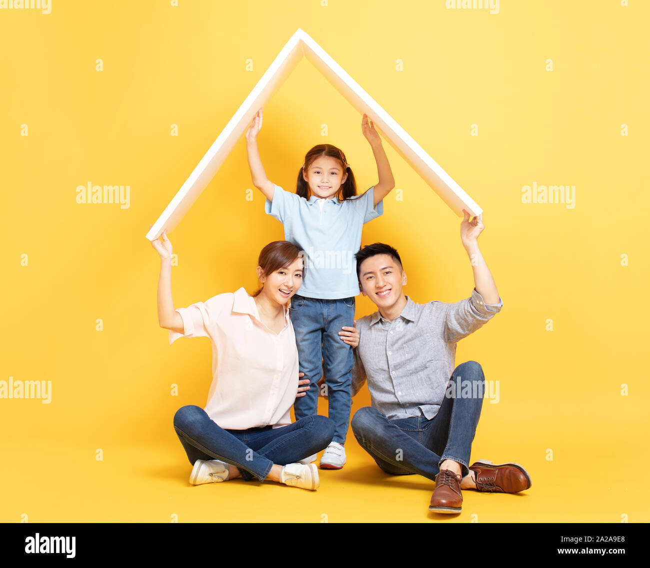 happy asian family  in new house with roof concept Stock Photo