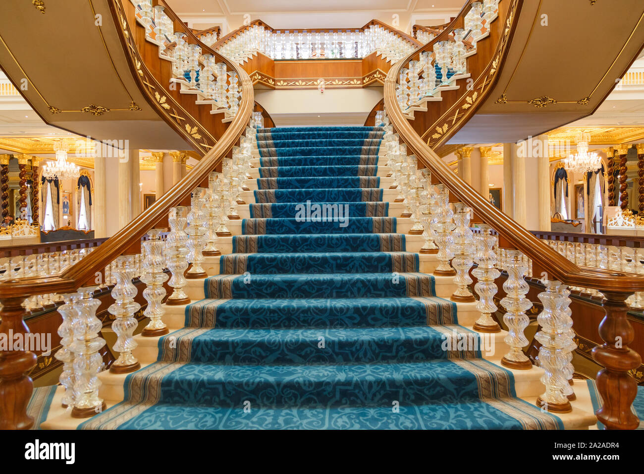 ANTALYA, TURKEY - SEPTEMBER 12, 2019: Main staircase in lobby of Titanic Mardan Palace luxury hotel, the most expensive European's resort. Stock Photo