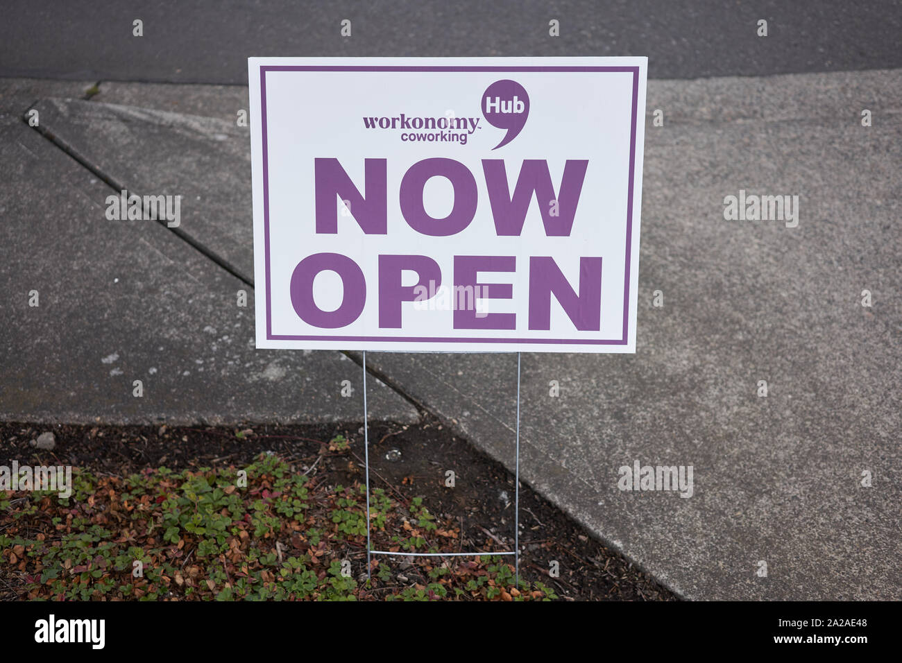 Tigard, Oregon, USA - Sep 16, 2019: A 'Now Open' sign outside a new Workonomy™ Hub Coworking Space location in an Office Depot Store in Tigard. Stock Photo