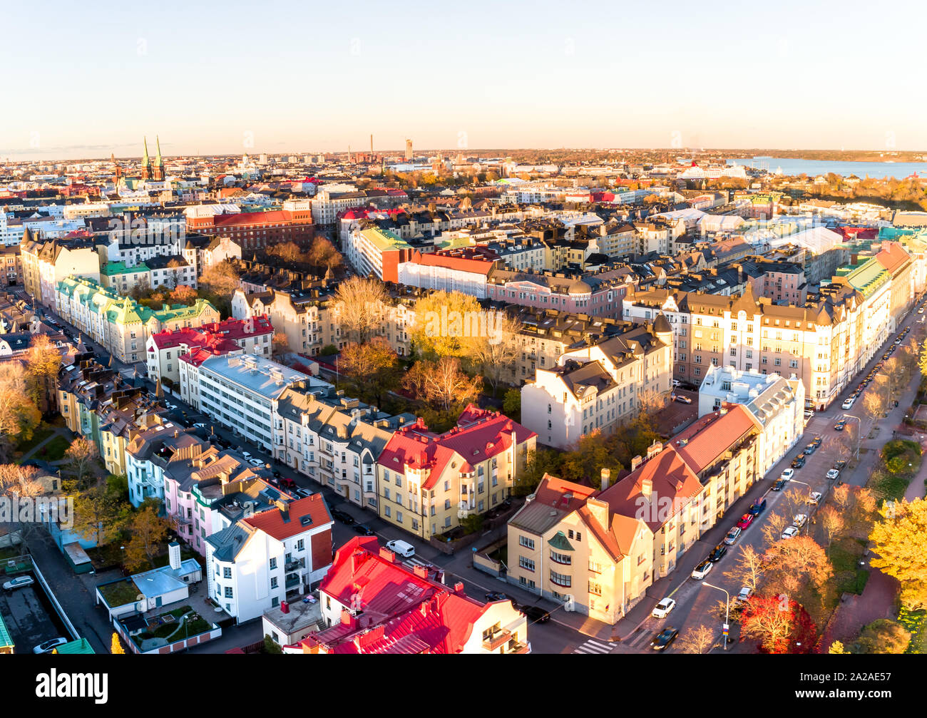 Aerial view of beautiful city Helsinki at sunset time. Blue sky and