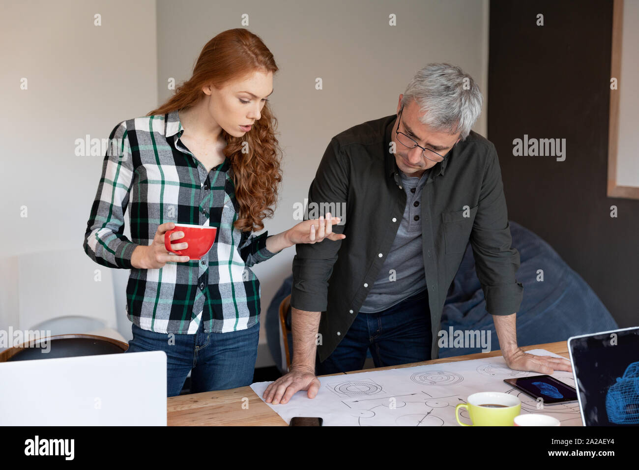Creatives brainstorming office meeting hi-res stock photography and ...
