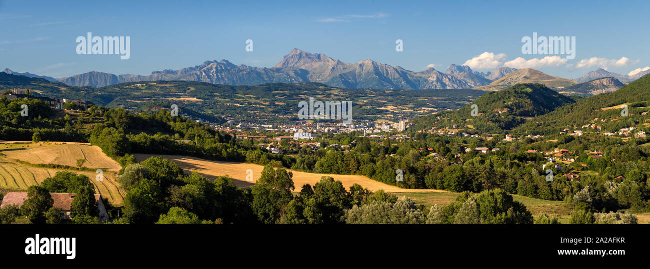 Summer panoramic view on the city of Gap and the Chaillol Peak in the background. Hautes-Alpes, Alps, France Stock Photo