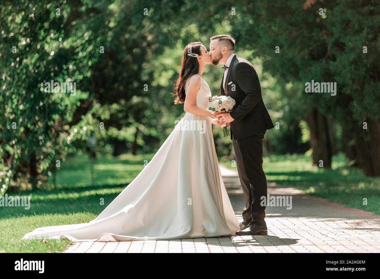Loving couple newlyweds standing hi-res stock photography and images ...