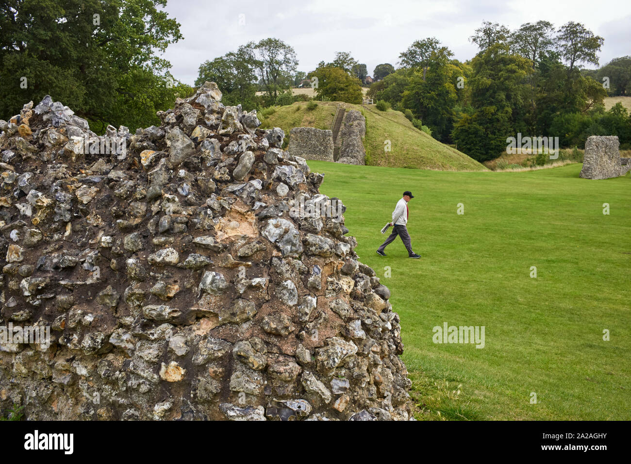 Berkhamstead Castle remains with flint walls and keep mound Stock Photo