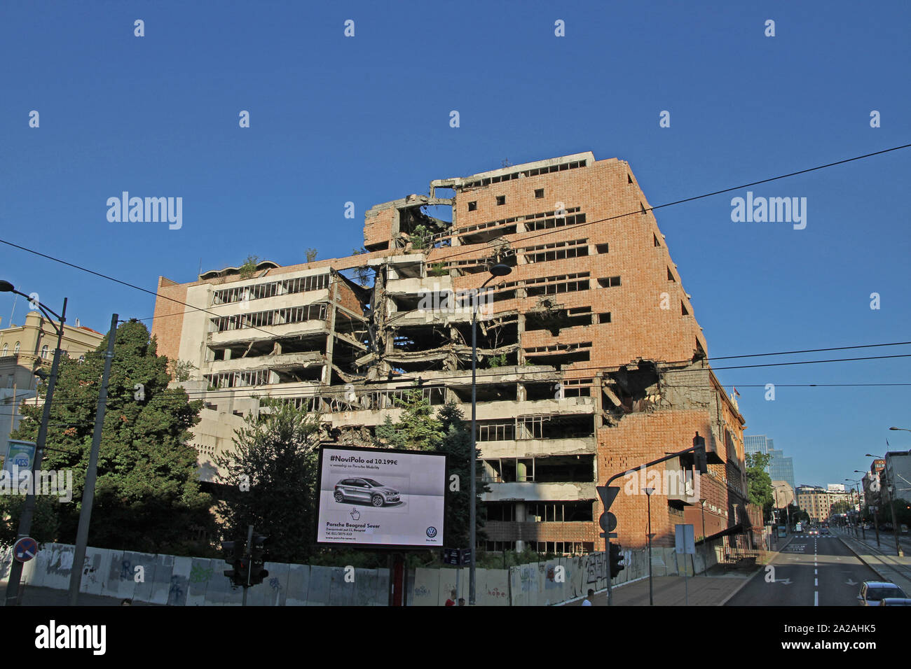 Apartment building blocks and old remains of The Yugoslav Ministry of Defence building AKA Yugoslav General Staff from the 1999 NATO bombed buildings, Belgrade Central, Serbia. Stock Photo