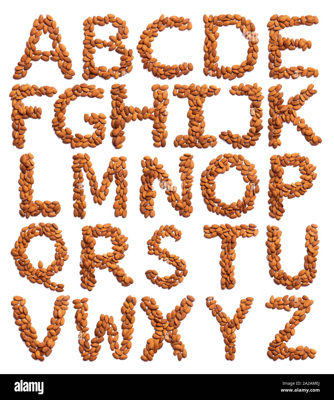 English alphabet from a peeled almond on a white isolated background ...