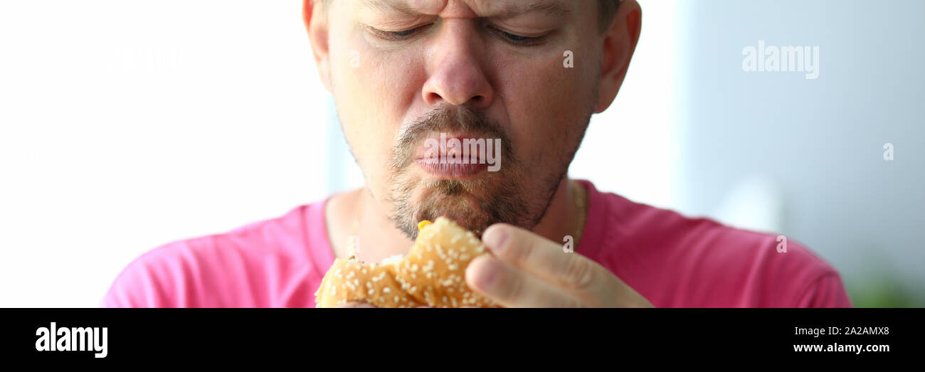 Disappointed hungry man Stock Photo