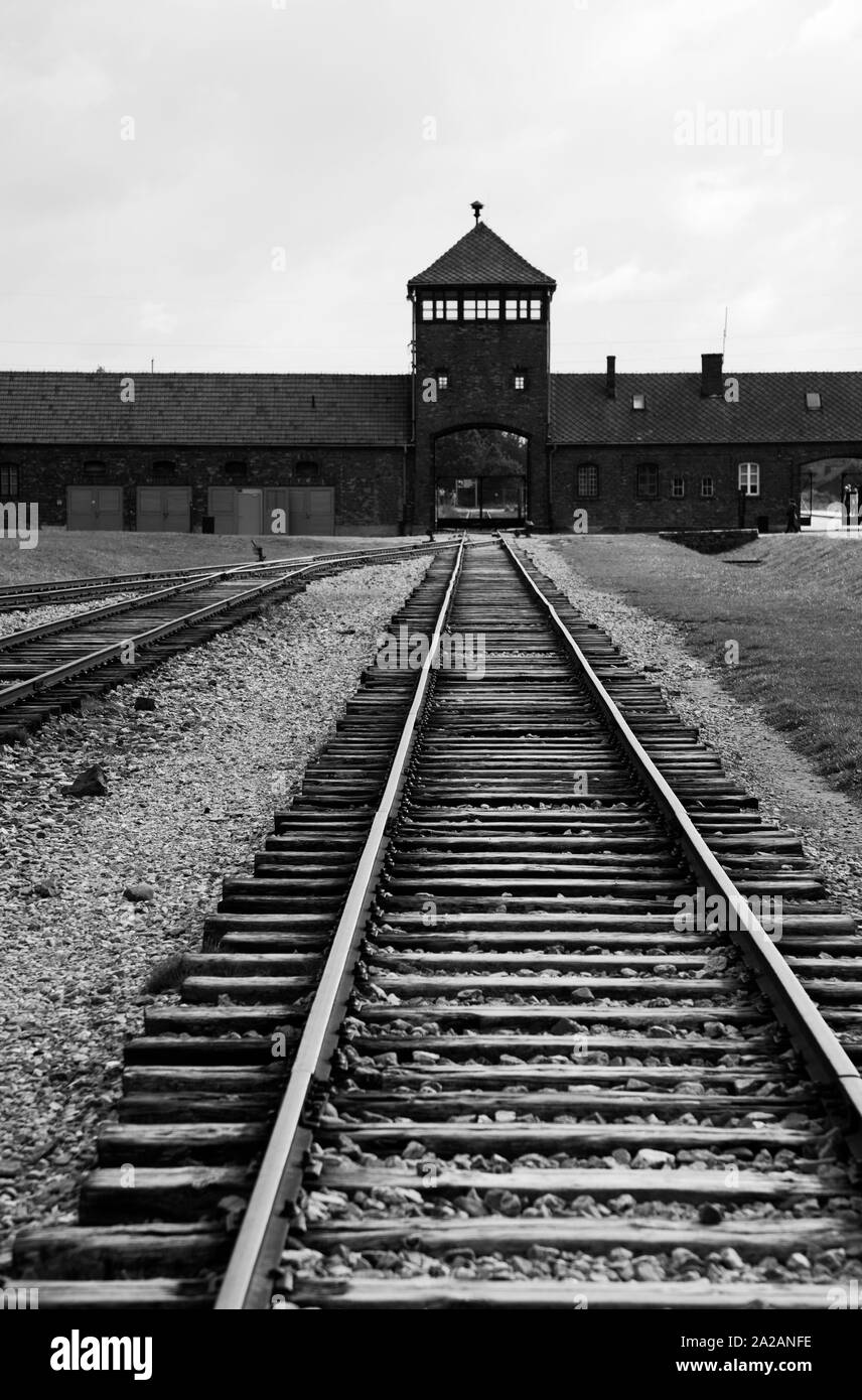 Main gate and train transit arch, Auschwitz-Birkenau, former German Nazi concentration and extermination camp, Oswiecim, Poland. Stock Photo