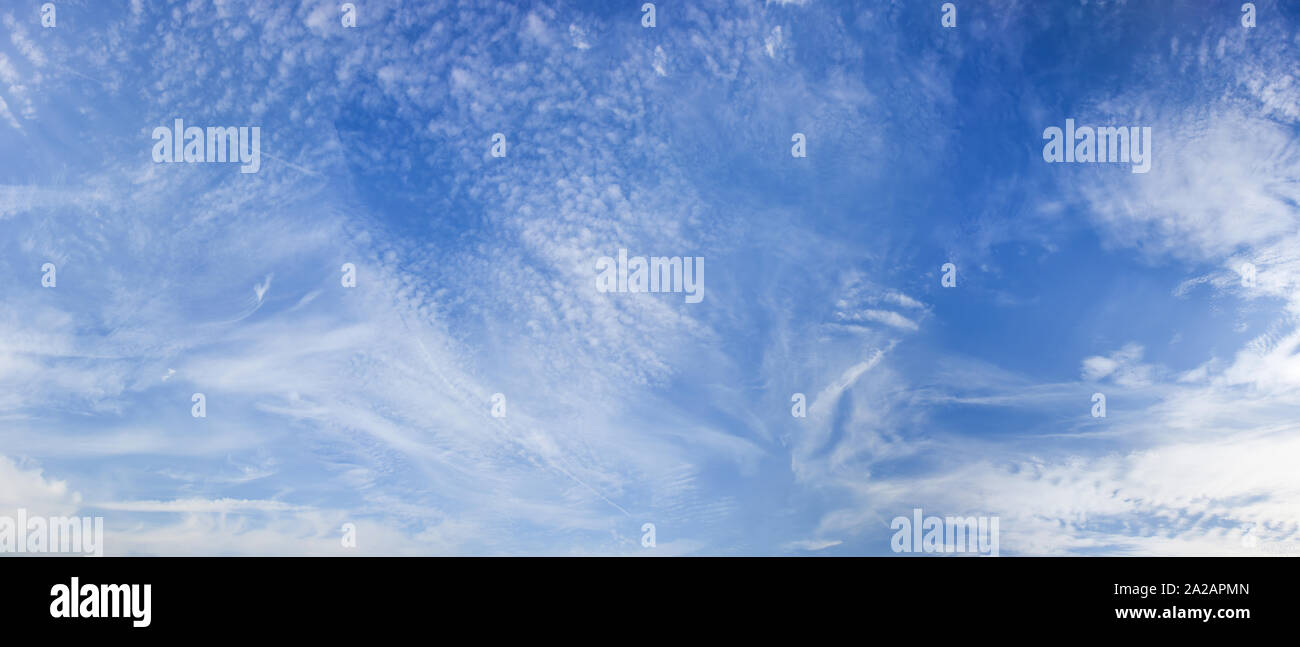 Panorama of the blue sky with white clouds as a background Stock Photo ...