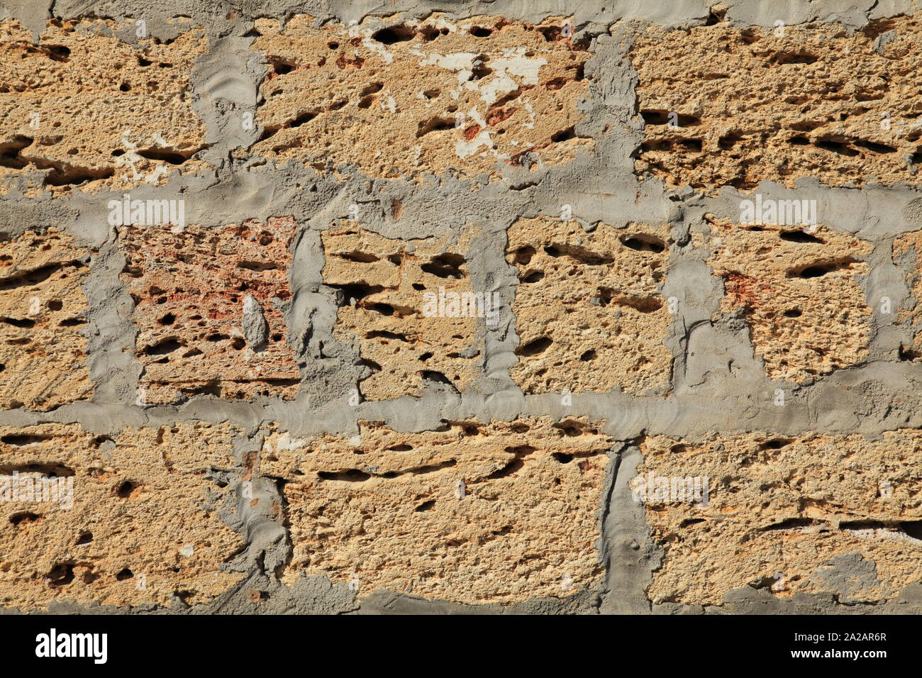 The shell rock brick wall, texture. The fragment of a new bricklaying. The construction of a new privat building. Ecological house Stock Photo