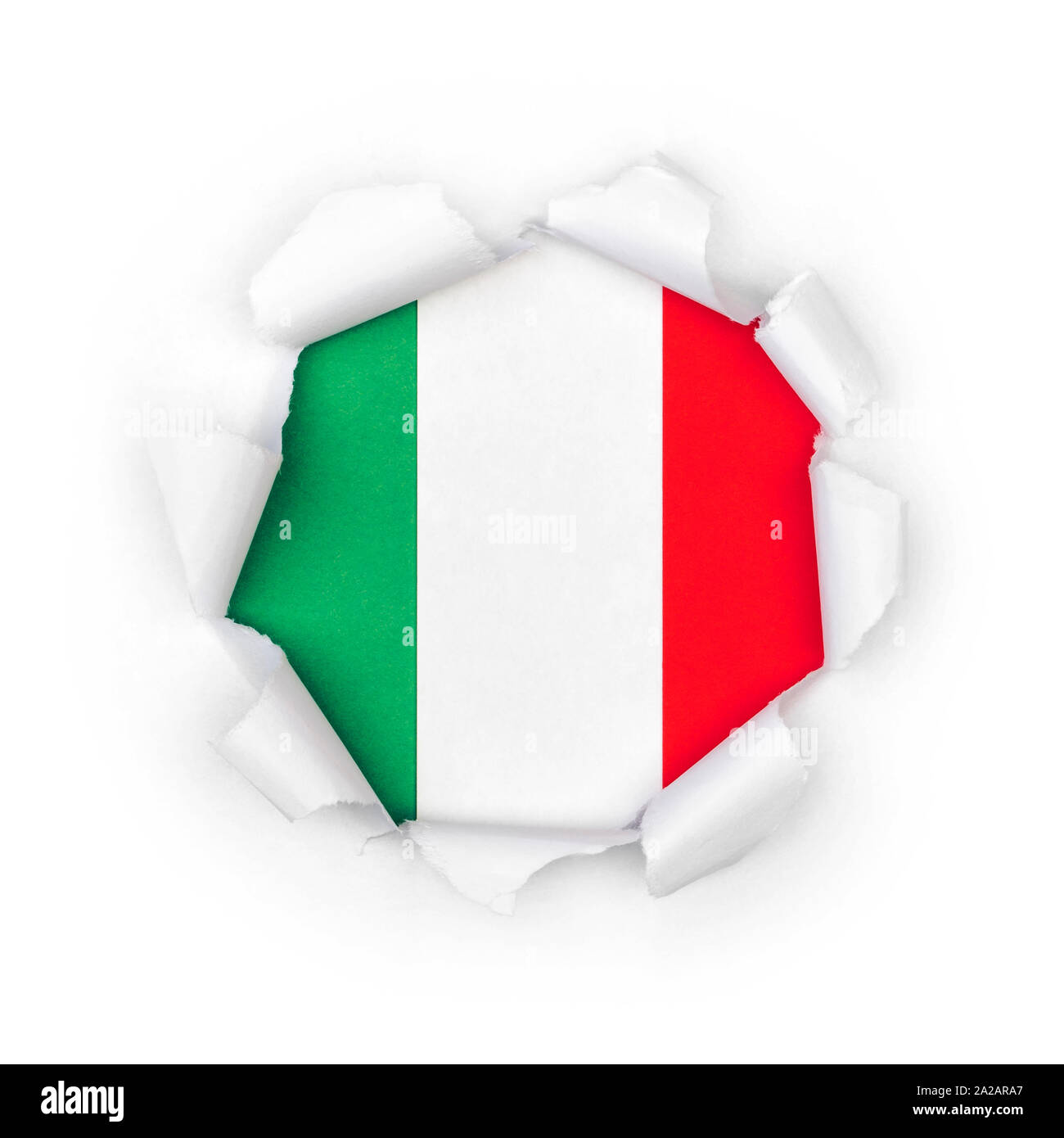 View of the italian flag through the big breakthrough in the paper. Stock Photo