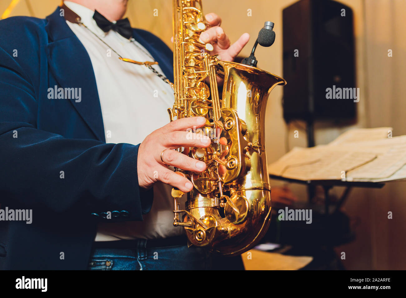 Saxophone classical music instrument Saxophonist with alto sax closeup
