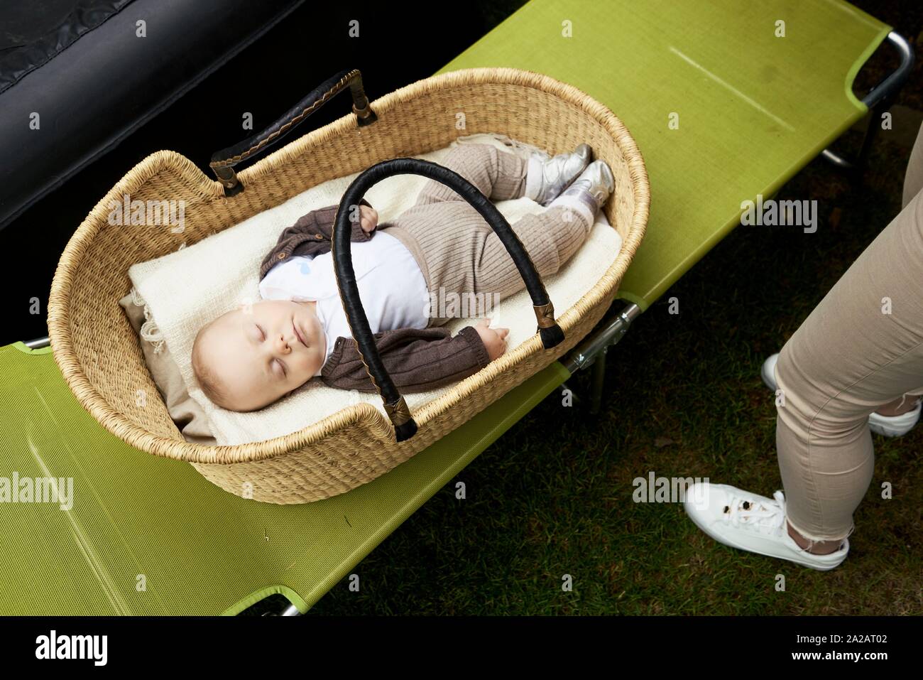 Baby In Cradle High Resolution Stock Photography and Images Alamy