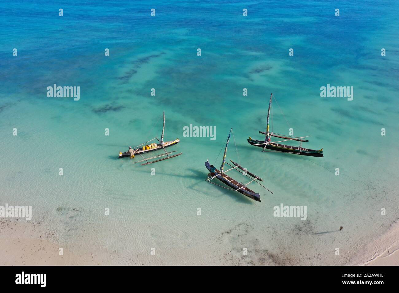 outrigger boats on the coral reef near Salary, South Western coast of Madagascar. Stock Photo