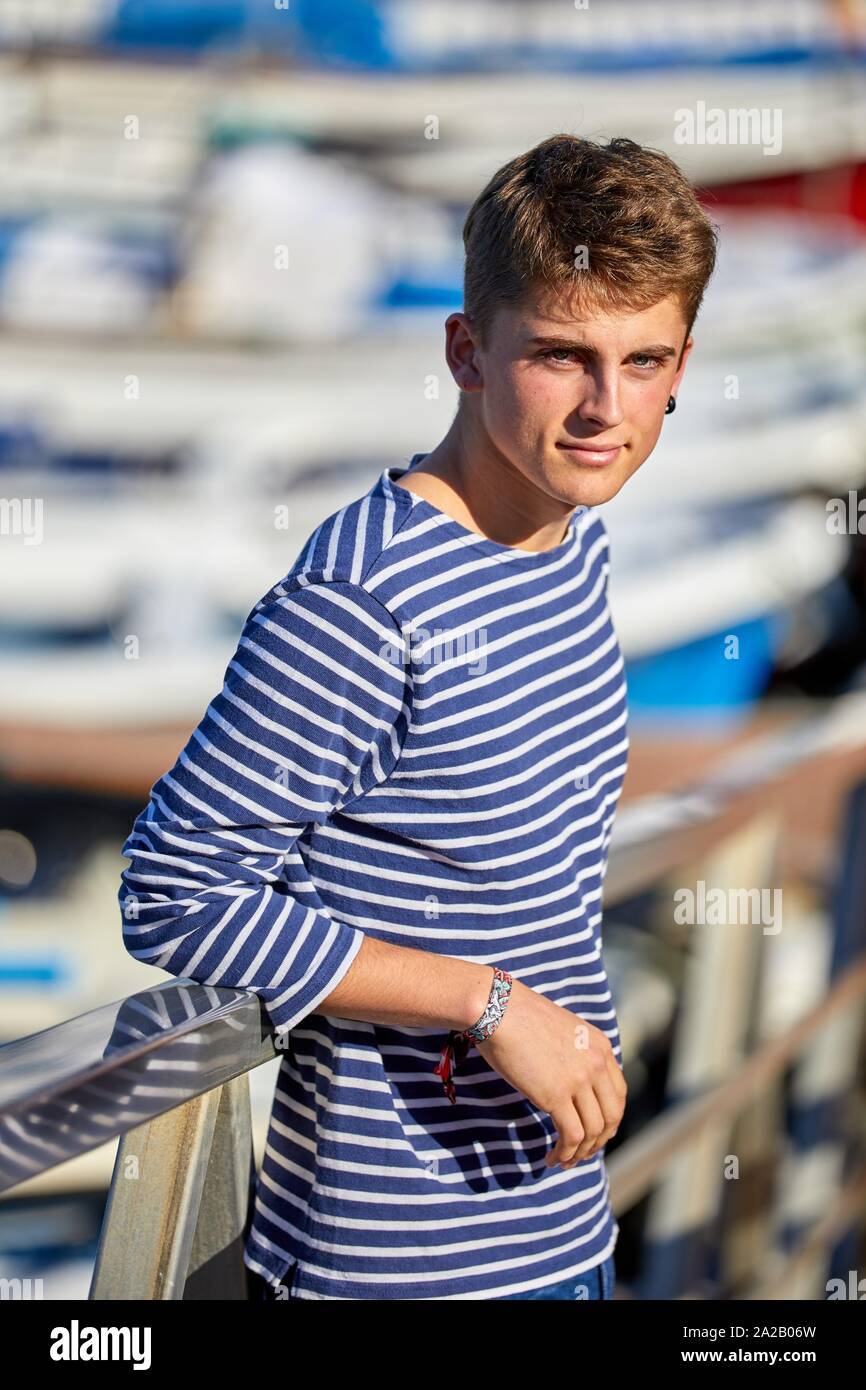 Young man with sailor clothes, Fishing port, Getaria, Gipuzkoa, Basque Country, Spain Stock Photo