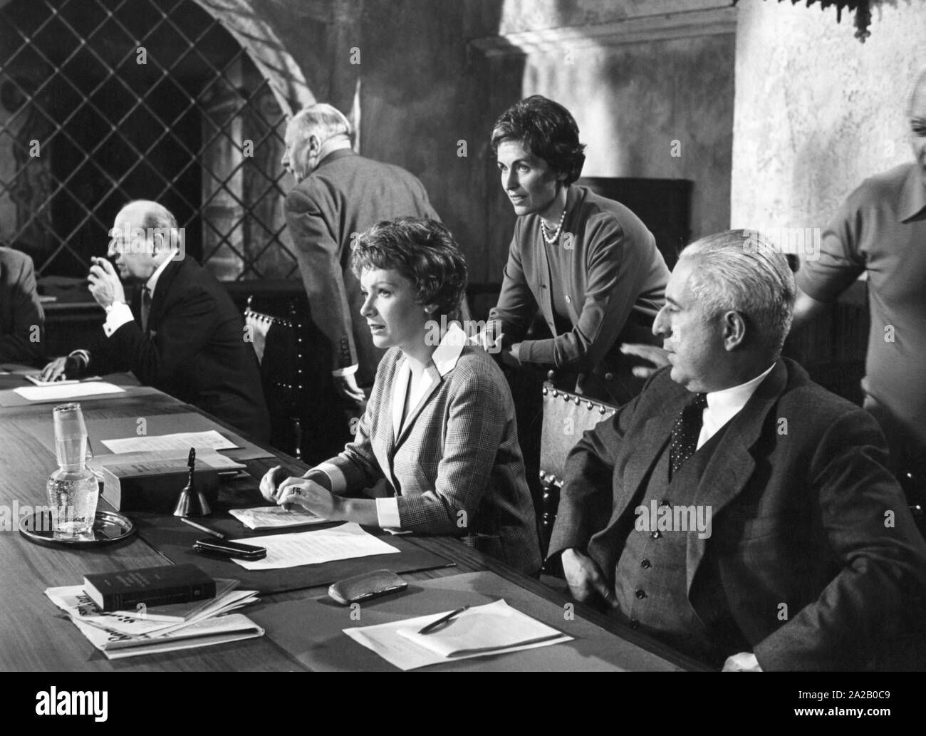 Dr. Hildegard Hamm-Bruecher (behind) as a consultant for the film 'The Ideal Woman', in which the actress Ruth Leuwerik (middle) plays a councilwoman. On the right, the Hungarian director Josef von Baky. Stock Photo