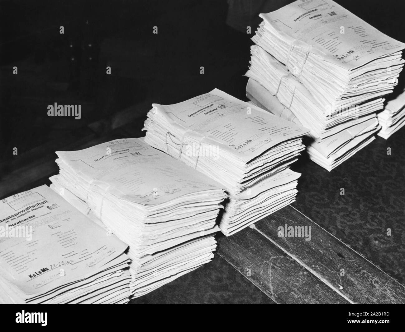 The records in the money counterfeiting process are piled up in front of the Deggendorf district court. Stock Photo