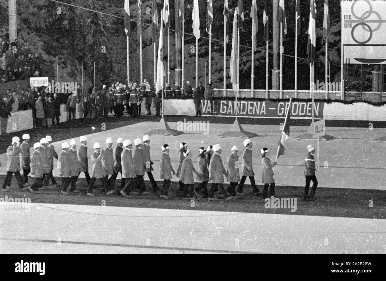 The Alpine World Ski Championships took place in Val Gardena between 7.2.1970 and 15.2.1970, and it had been the only World Cup so far, the results of which were included in the Alpine Ski World Cup.  Photo of the Italian team moving into an ice stadium, presumably the uncovered St. Ulrich stadium at that time. Stock Photo