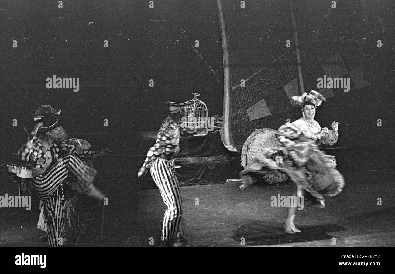 Performance of the dancer and choreographer Katherine Dunham and her dance troupe in Munich. In May 1954 she was on tour with the program 'Caribbean Rhapsody' in 6 German cities. The costumes and decoration were the responsibility of her husband John Pratt. Dunham was one of the most famous dance teachers and choreographers in the US, beside that she was a PhD anthropologist, civil rights activist and author. Stock Photo