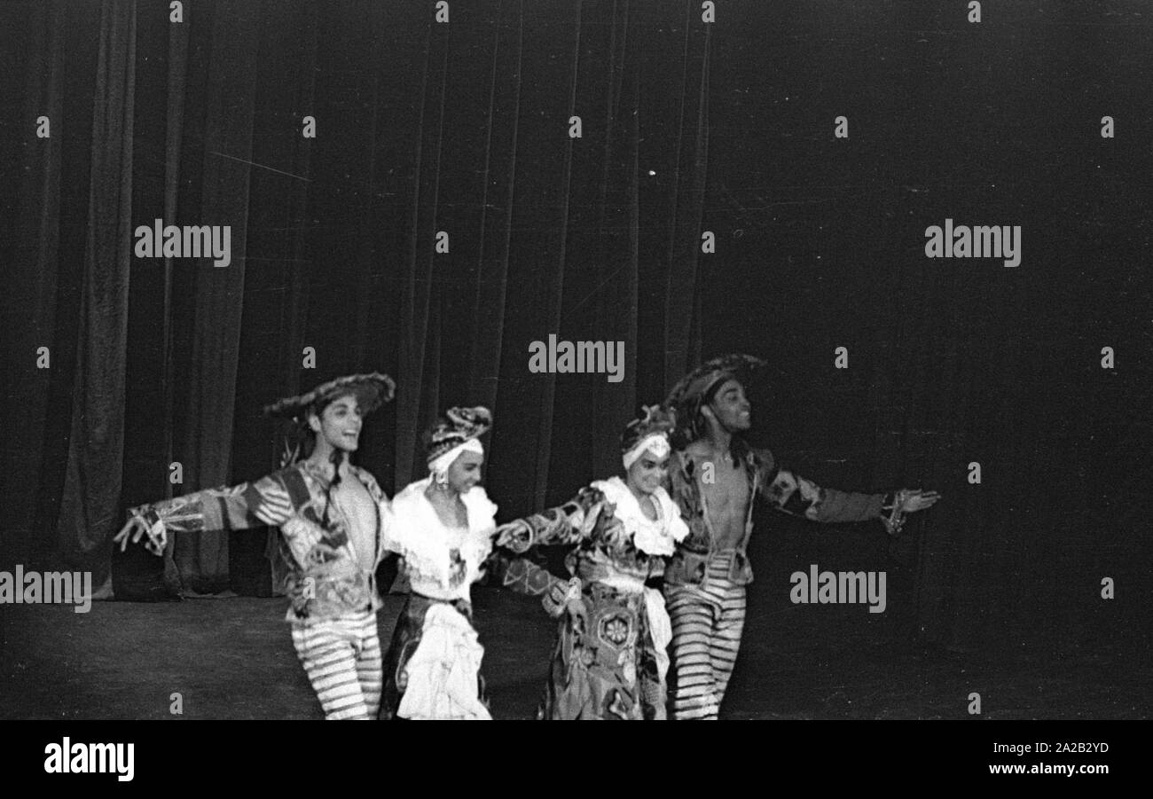 Performance of the dancer and choreographer Katherine Dunham and her dance troupe in Munich. In May 1954 she was on tour with the program 'Caribbean Rhapsody' in 6 German cities. The costumes and decoration were the responsibility of her husband John Pratt. Dunham was one of the most famous dance teachers and choreographers in the US, beside that she was a PhD anthropologist, civil rights activist and author. Stock Photo