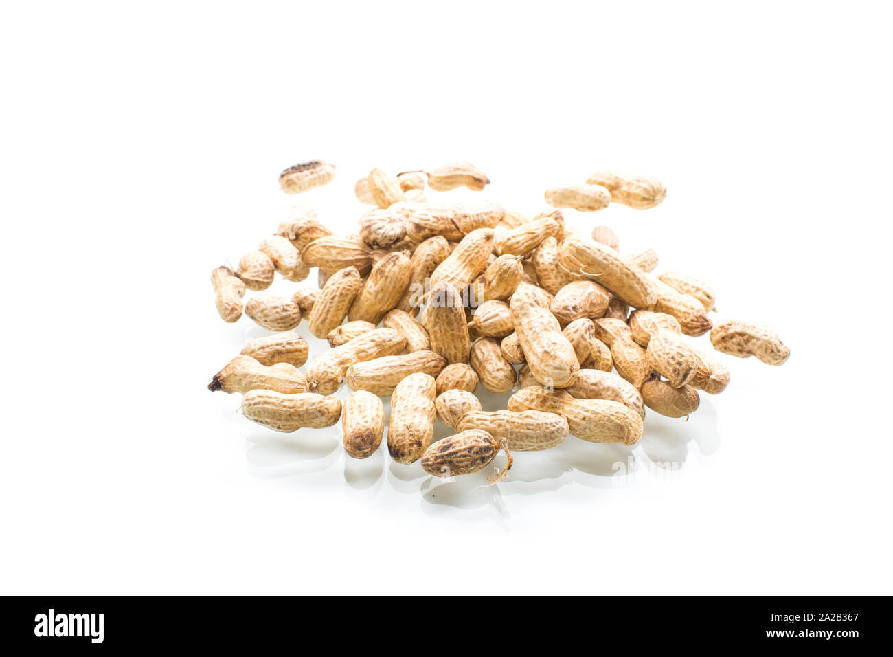 ripe organic peanuts in shell isolated on a white Stock Photo Alamy