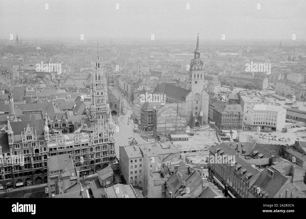 View of the old town of Munich from one of the windows of the southern tower of the Munich Frauenkirche. This photo was probably taken on the inauguration day of the new elevator. Stock Photo