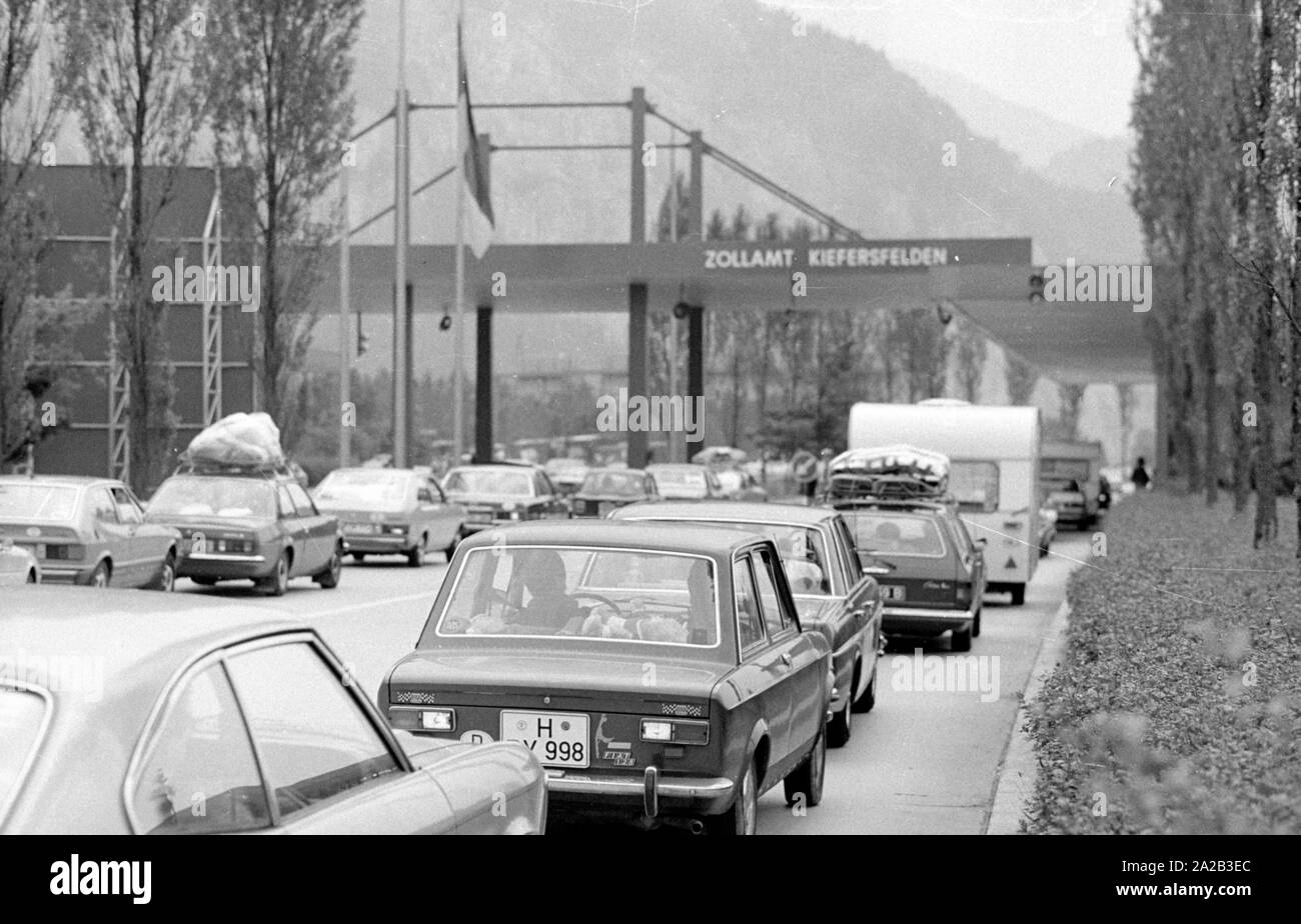 During the summer holidays mile-long traffic jams occur due to the tourist traffic. The picture shows a traffic jam at the border crossing Kiefersfelden on the A93. Stock Photo