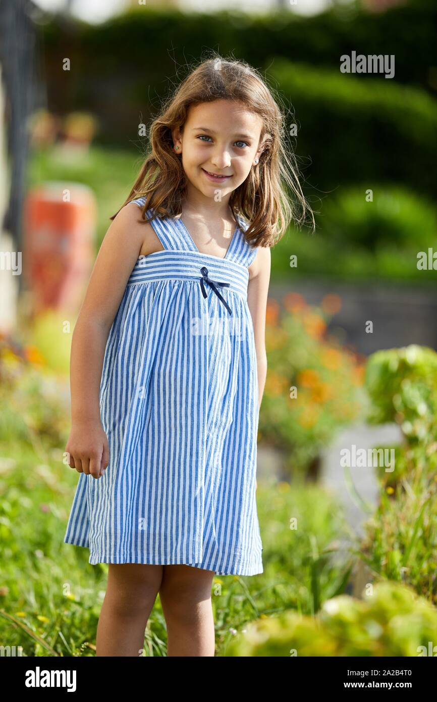 Portrait of young girl, looking at camera, Getaria, Gipuzkoa, Basque Country, Spain Stock Photo