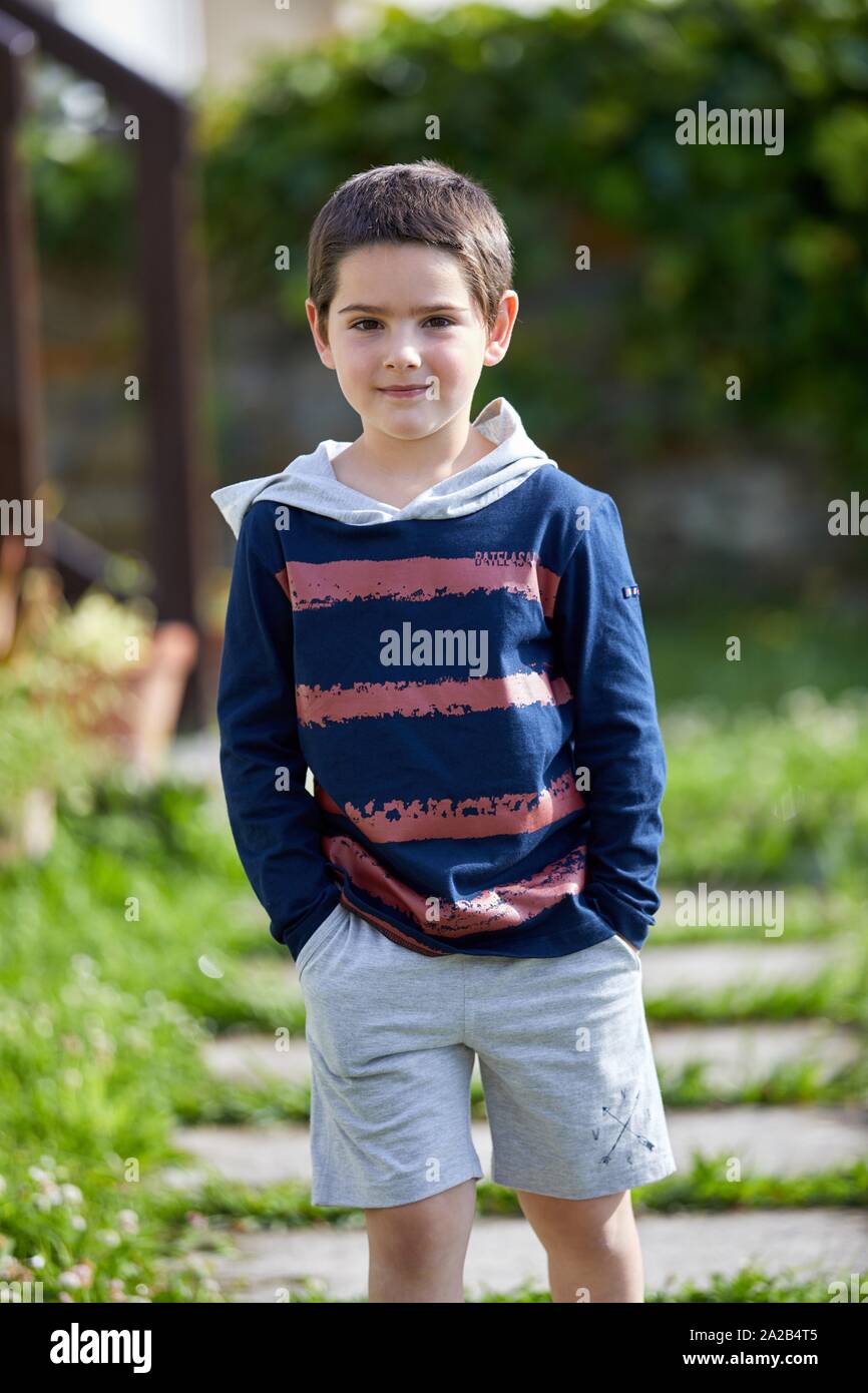 Portrait of young boy looking at camera, Getaria, Gipuzkoa, Basque Country, Spain Stock Photo