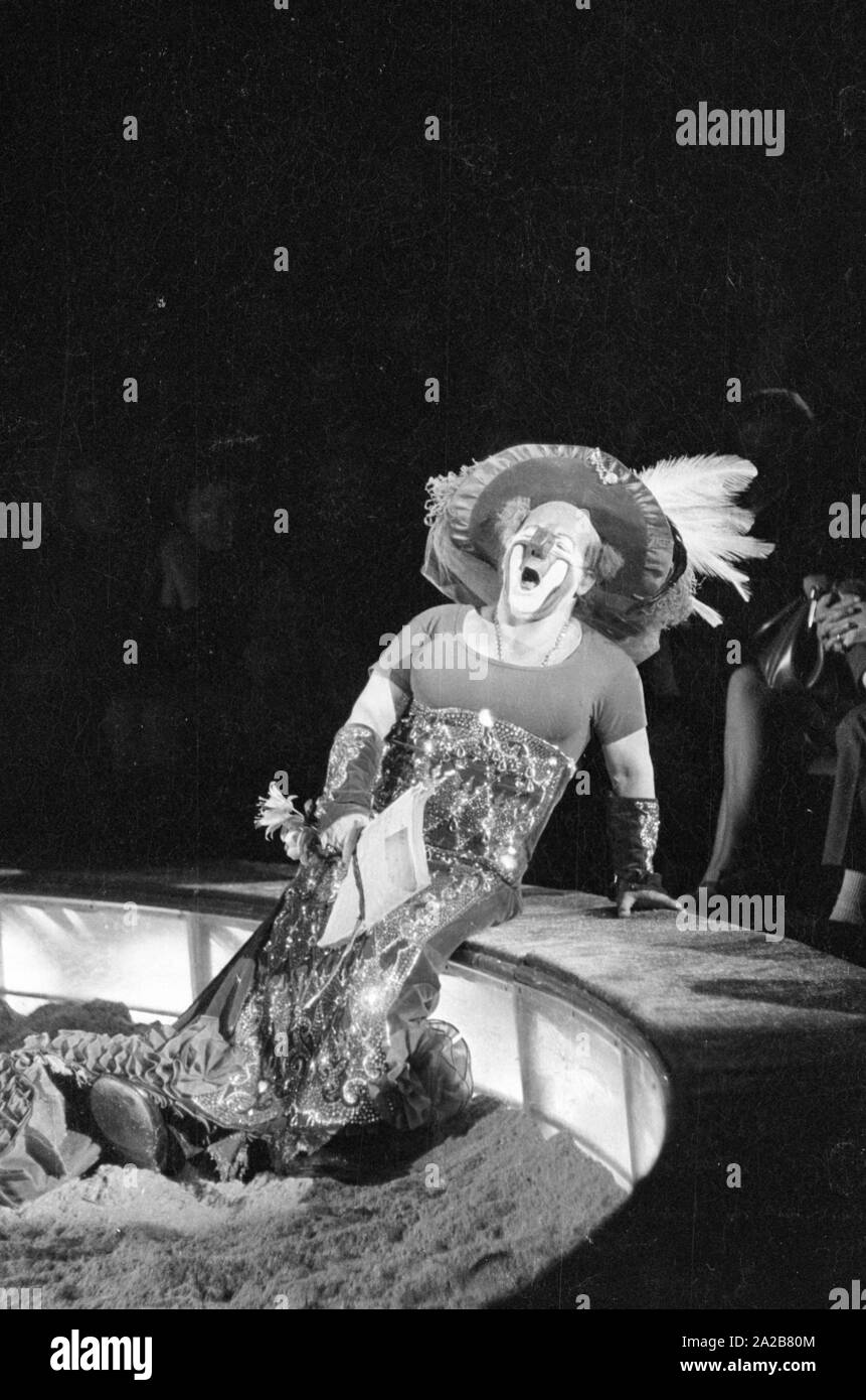 The Spanish clown Charlie Rivel dressed as a woman during a performance in 1971. Stock Photo