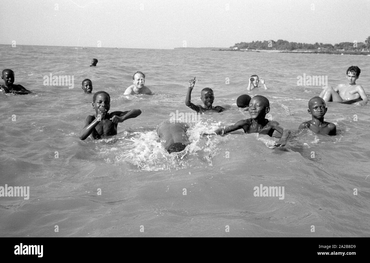 African Children Playing Black and White Stock Photos & Images - Alamy