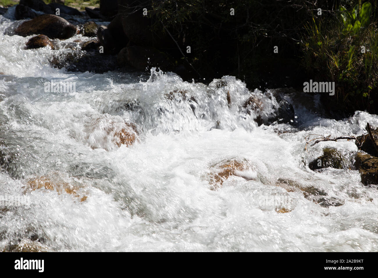 Natutrual Raging Rivers Water in the mountain raging river. Beautiful natural background of ...